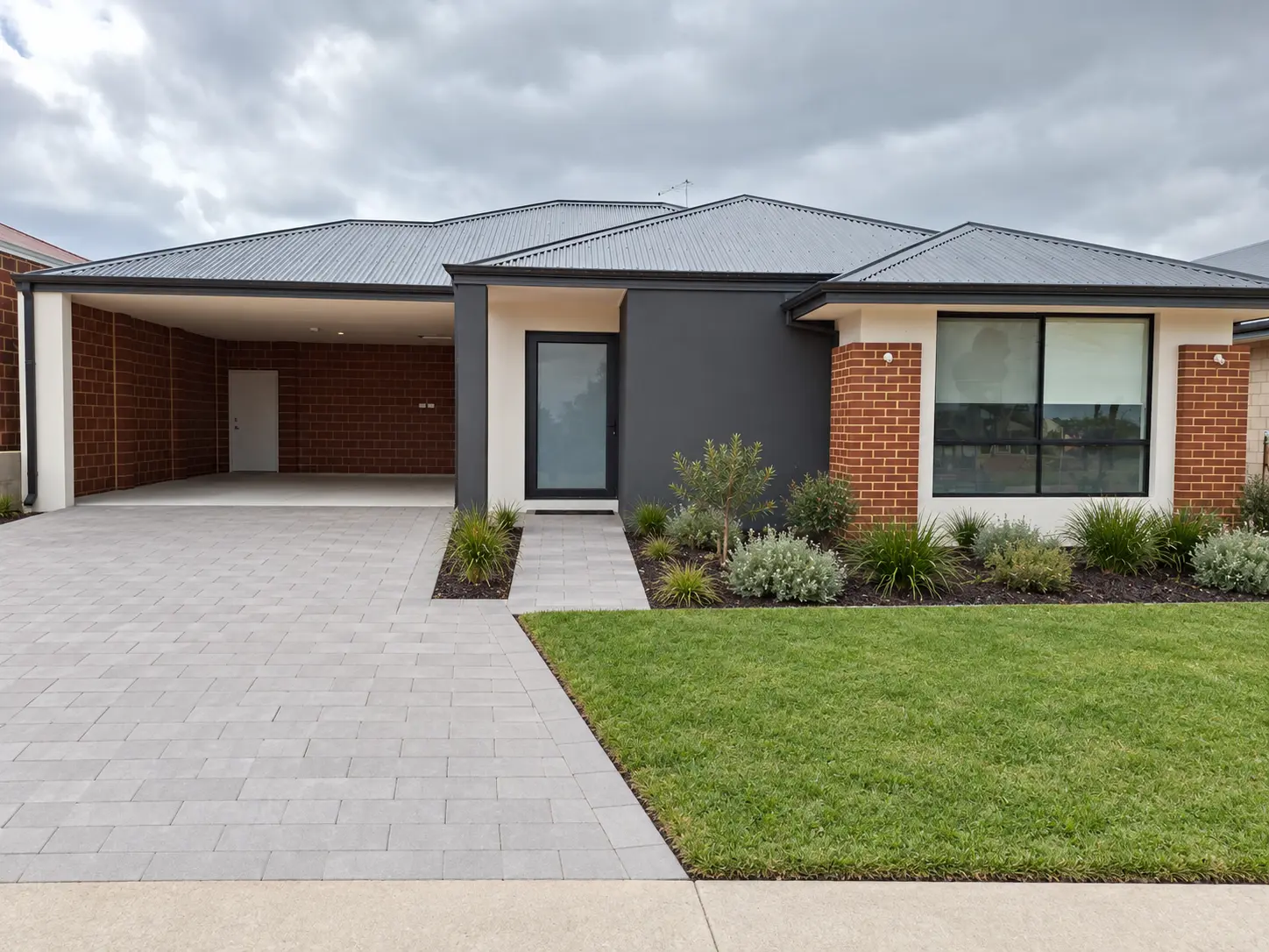 Planned paving and landscaping around the current single-storey home